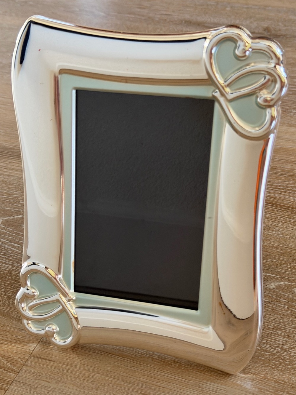 Elegant Silver-plated Picture Frame with heart accents
